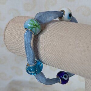 Skybound Blue Whisper Ribbon Bracelet